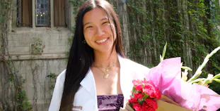 Dayna Pham in her white coat.