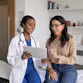 A patient talking to a doctor.