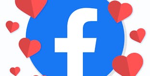 Illustrated Facebook logo surrounded by hearts. 