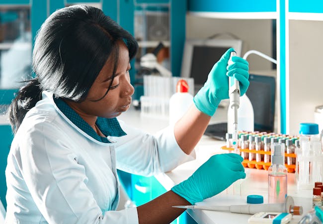 A female researcher working in a lab