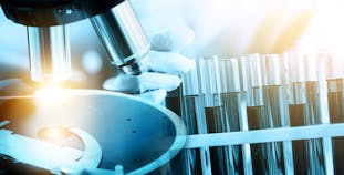 A microscope used by a researcher to study the impact of chemokines on inflammation related to psoriatic disease.