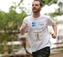 Runner Craig with a Team NPF Run shirt at the NYC Marathon.