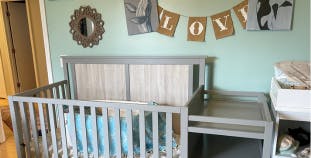 A decorated nursery and crib.