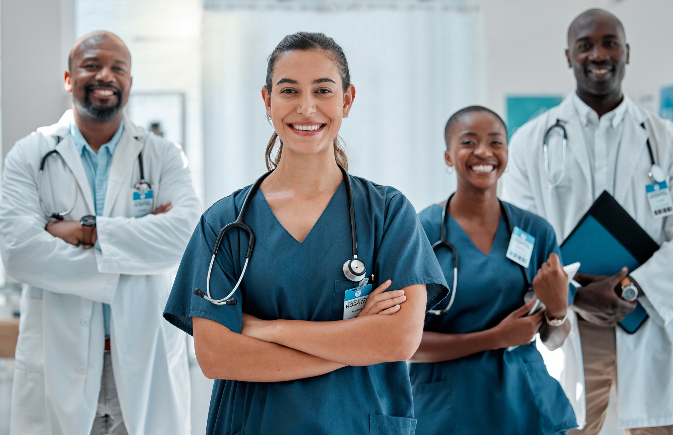 A group of doctors stand in a hospital.