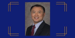 Headshot of Dr. Sam Hwang in a blue border.