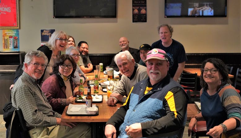 Group photo of several attendees from the Community Conference - Healthier Together: Learning for All Ages. Out to dinner.