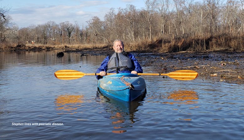 Stephen in a kayak on a river