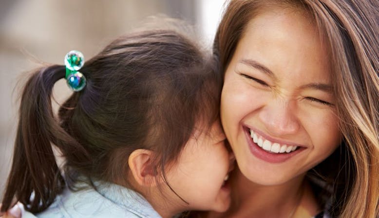Mother and child laughing