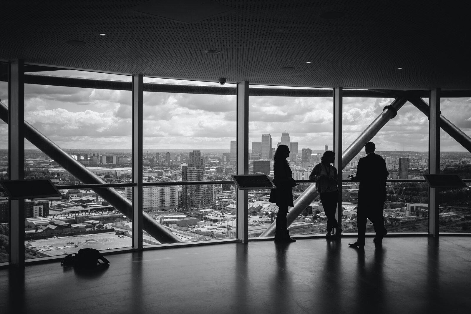 aspiring board members looking out over city skyline 