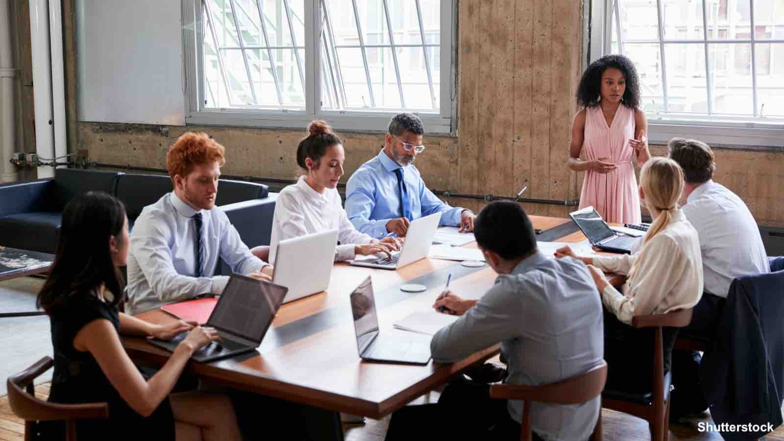 team meeting discussing lack of diversity on boards