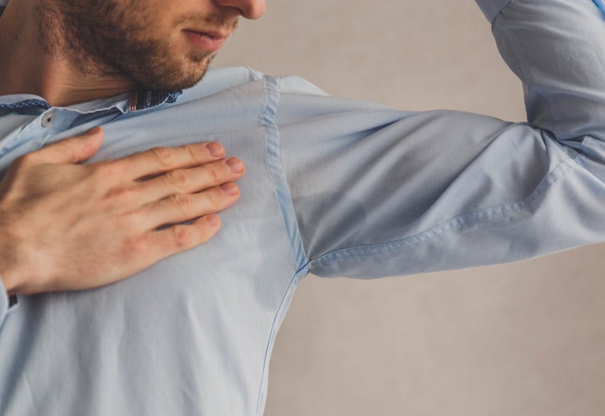 Man with sweat patch