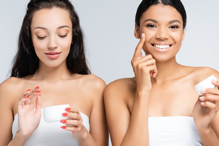 girls applying medical grade skin care for great skin