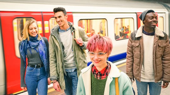Young people on the tube, London