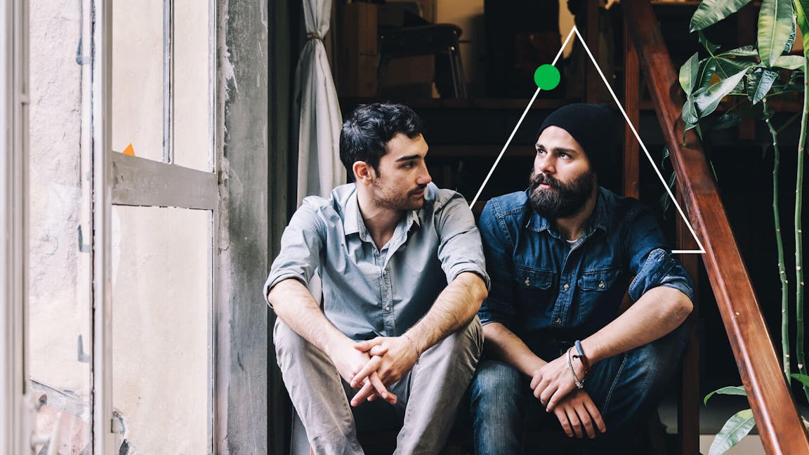 men sitting in doorway