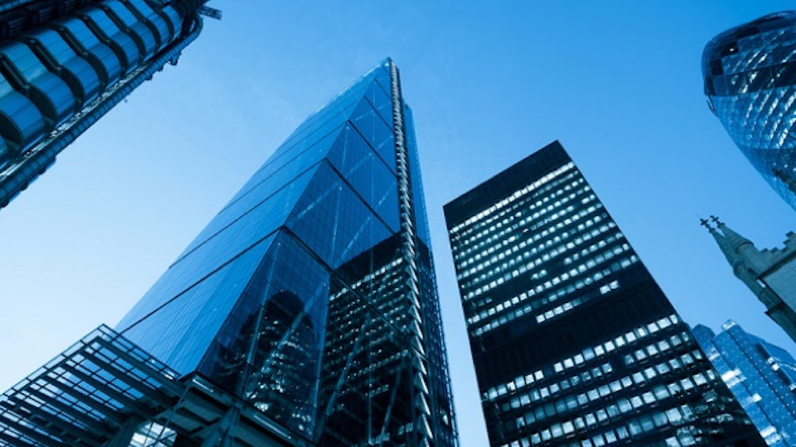 Photo of the city of london buildings looking up from the bottom
