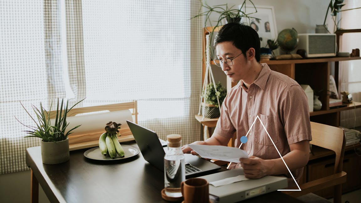 Man on his laptop at desk