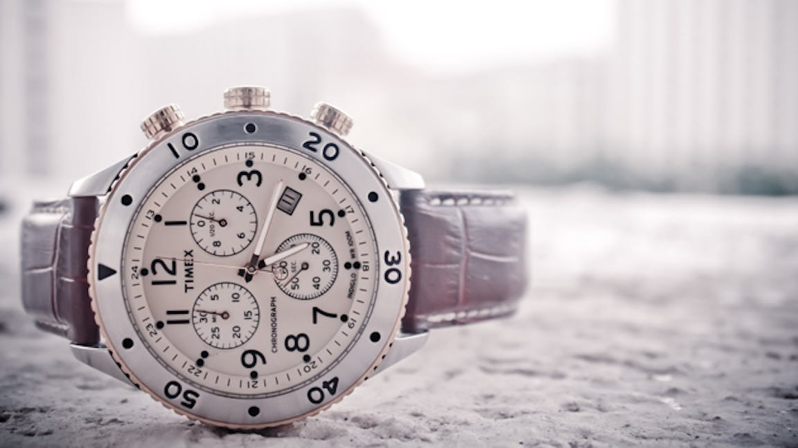 wristwatch city background