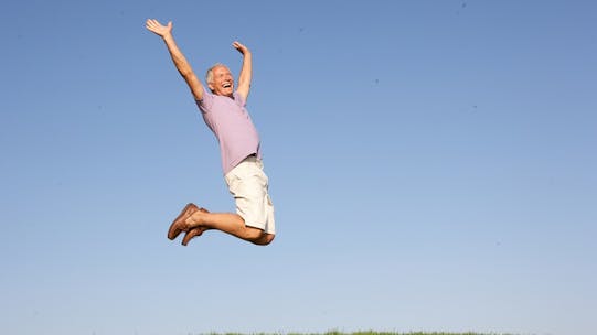 Retired man jumping