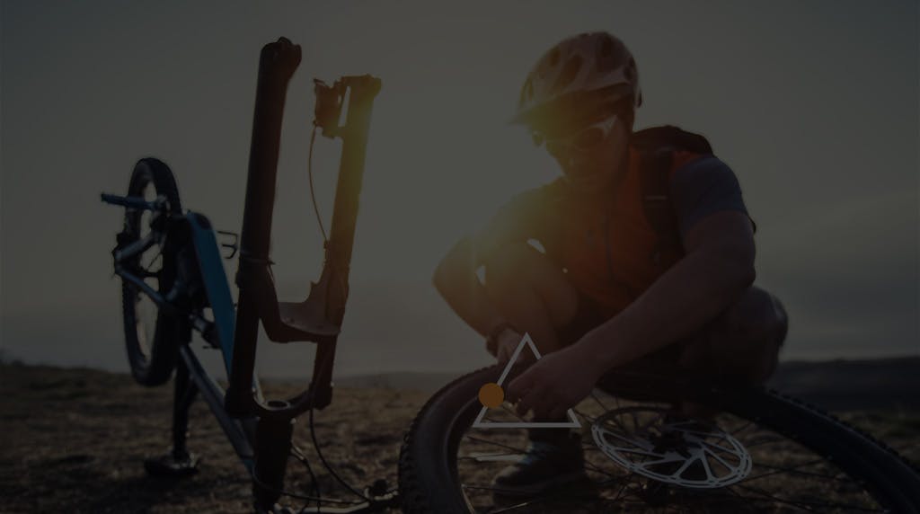 Man fixing bicycle