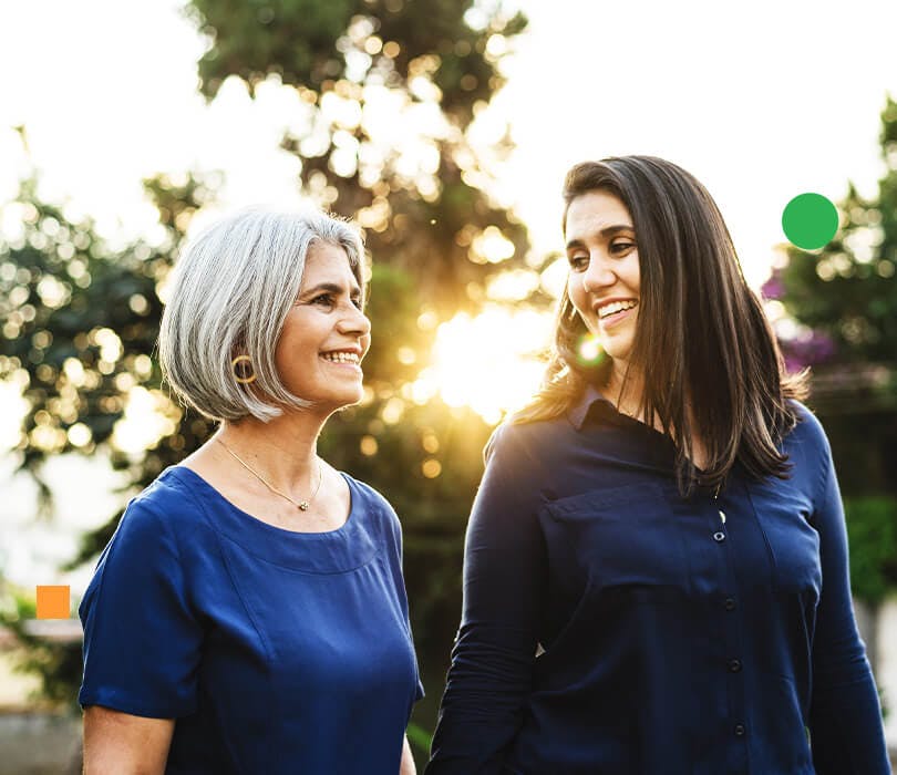 Mother and daughter walking together