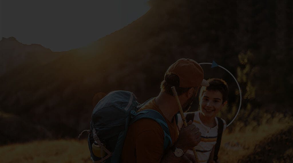 Man hiking with a child