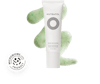 White bottle of Nutrafol Build-Up Blocker Scalp Microbiome Exfoliating Mask with green scalp exfoliator gel behind the bottle.