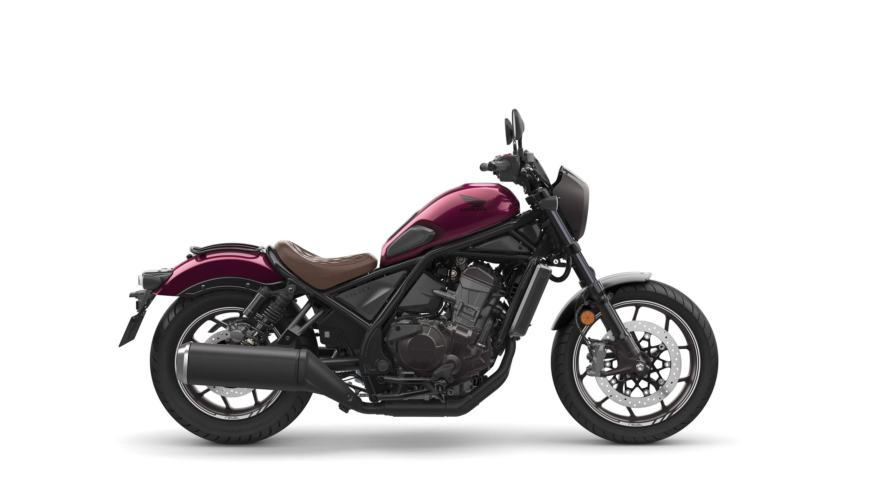 Hliðarsvipur rauðu Honda CMX1100D Rebel 