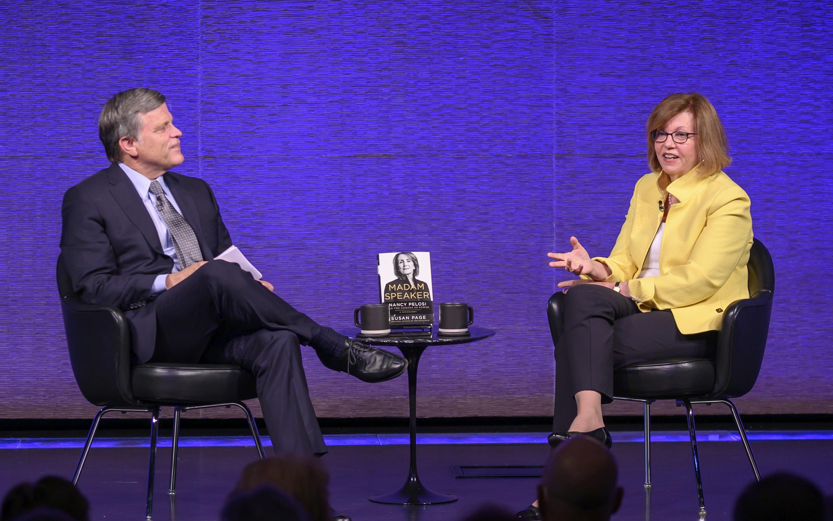 Douglas Brinkley and Susan Page on stage in the auditorium during a talk on Nancy Pelosi