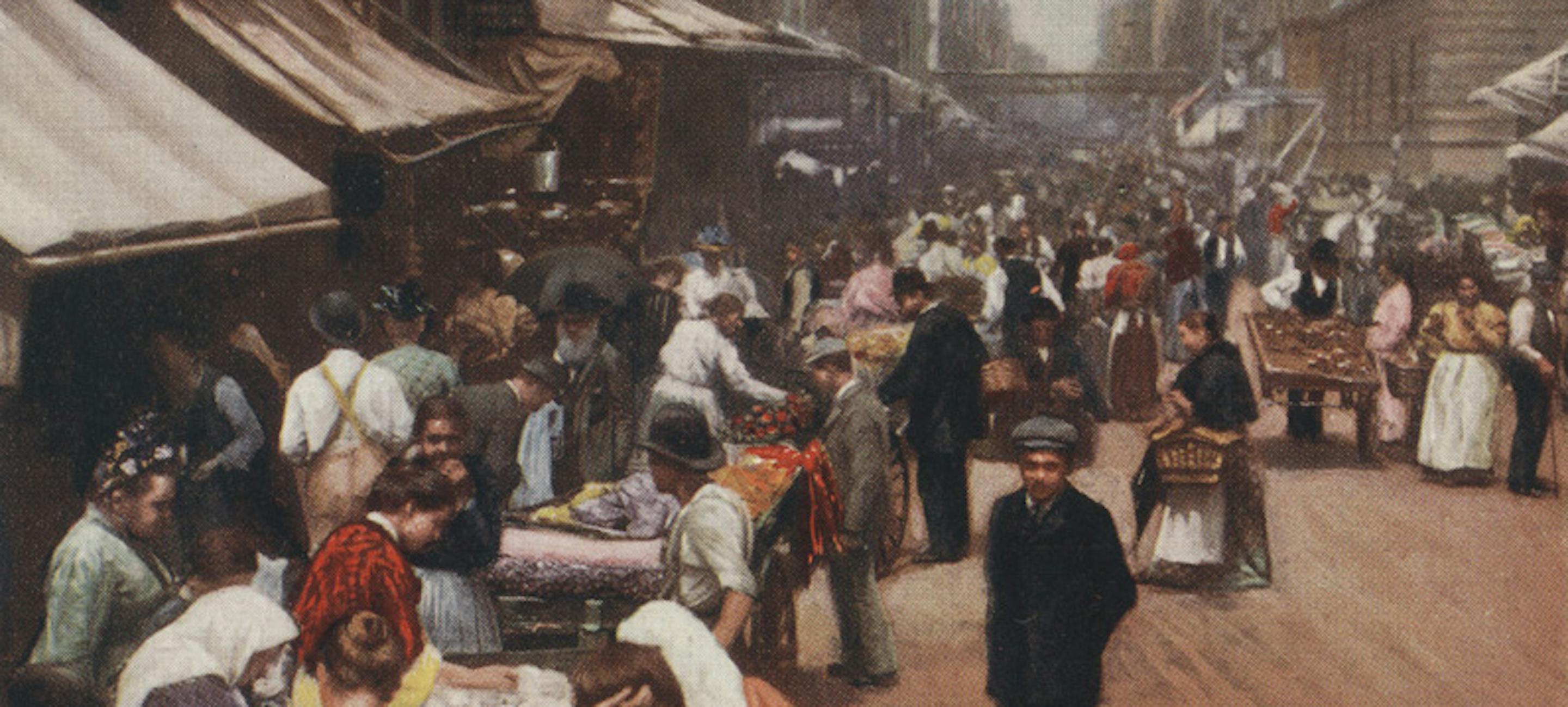 Image from a 1900 postcard showing a bustling scene on Hester Street with a lot of street vendors