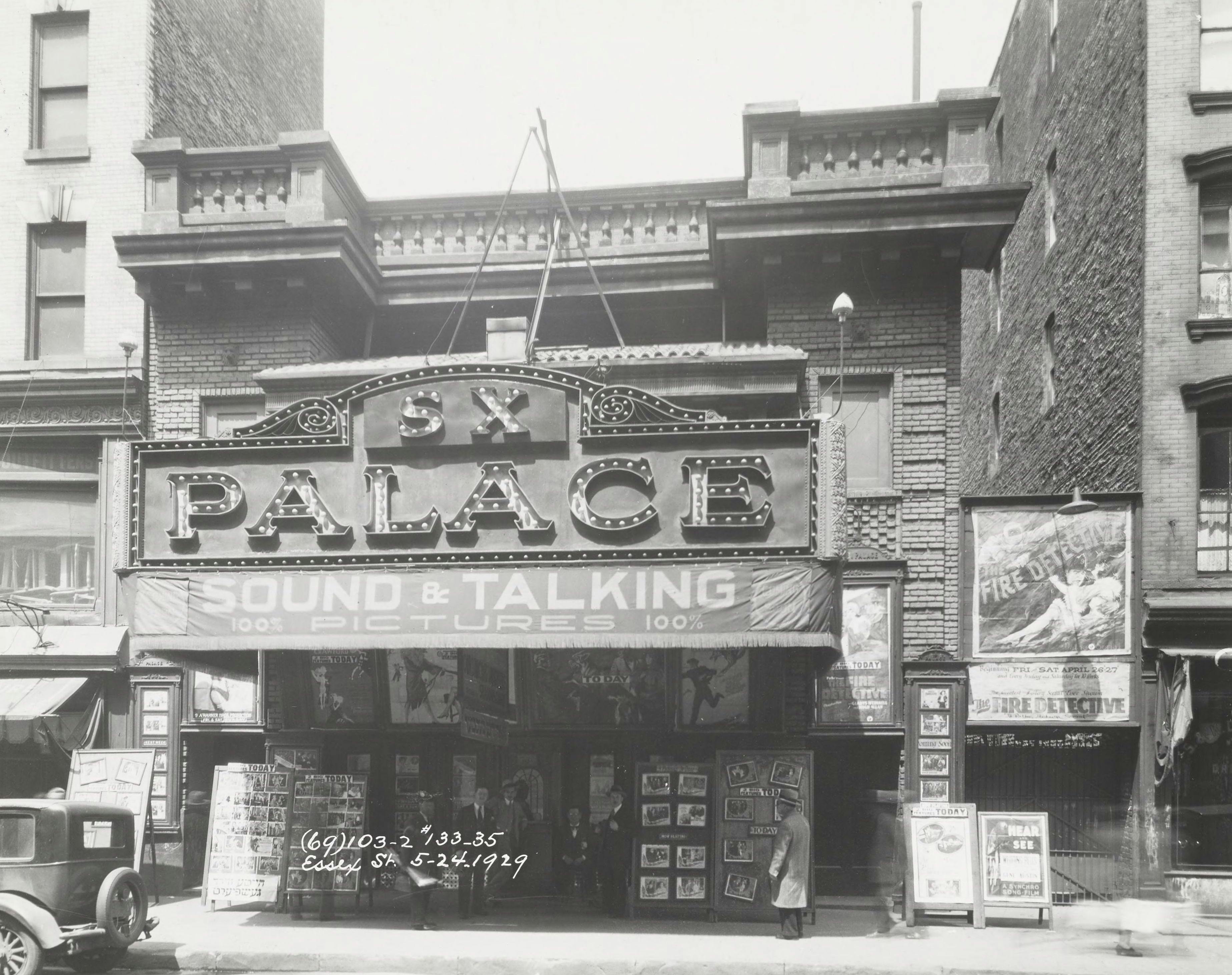 A movie theater advertising sound and talking pictures on Essex St. in Manhattan in 1929