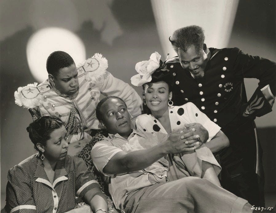 A still from the 1943 movie Cabin in the Sky starring Ethel Waters, Eddie “Rochester”Anderson, and Lena Horne