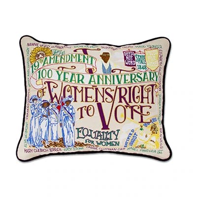 an embroidered pillow dedicated to the history of the 19th amendment and women's right to vote