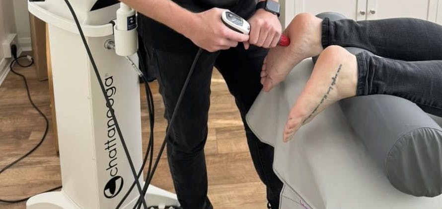 Therapist treating foot