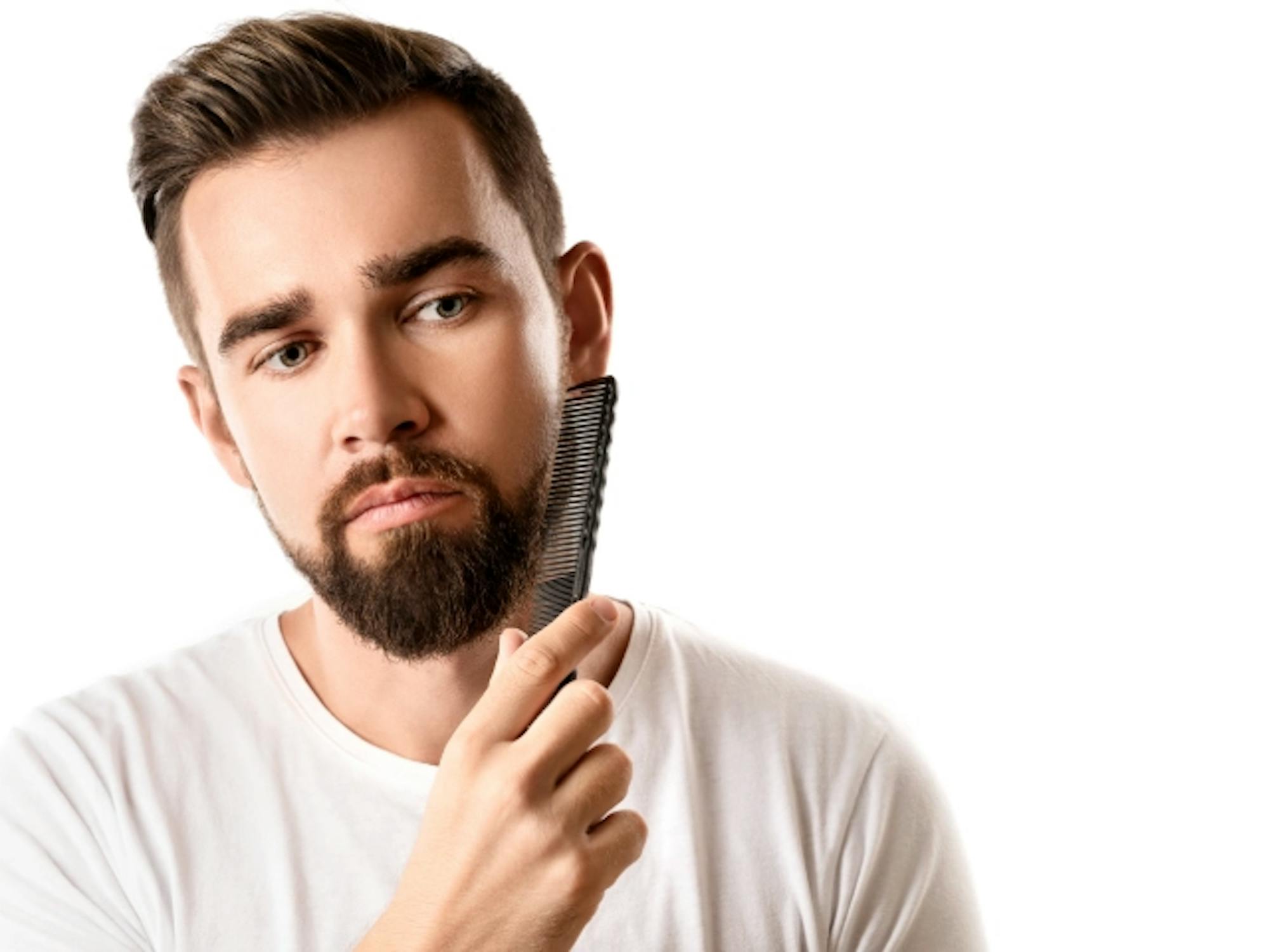 Picture of man grooming his beard