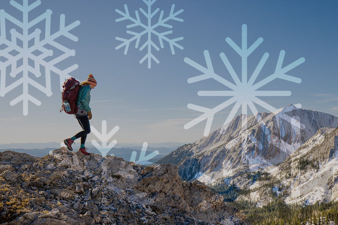 Woman hiking mountain landscape in Oboz Bridger hiking boots