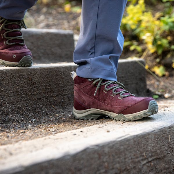 Ousel Mid Waterproof going down some steps