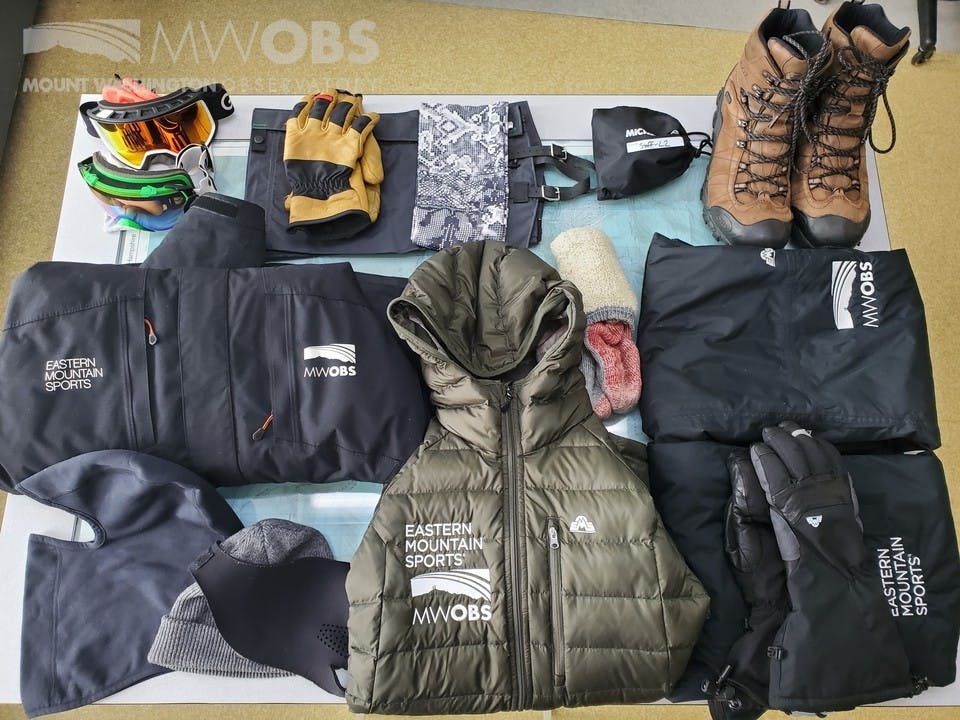 Mount Washington Observatory gear including goggles, winter clothing and Oboz winter insulated boots.