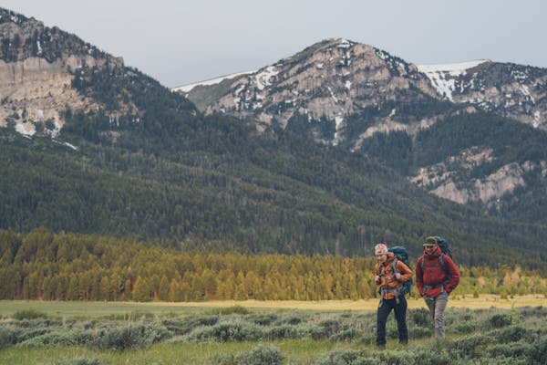 Two hikers on a trail in Yellowstone