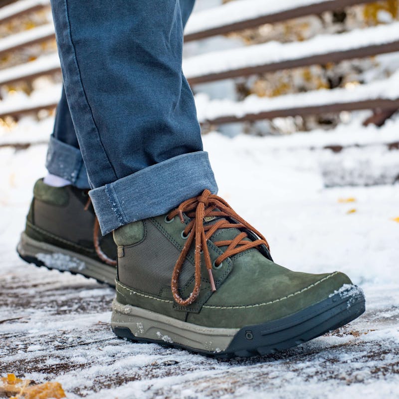 Oboz Burke Chukka casual boot on a snowy winter path.