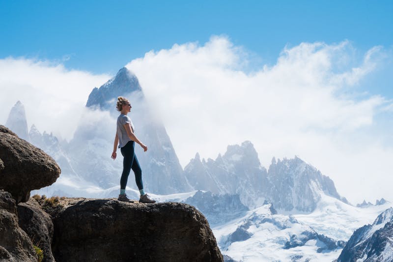 Woman hiking in Patagonia wearing Oboz Sawtooth X hiking boots