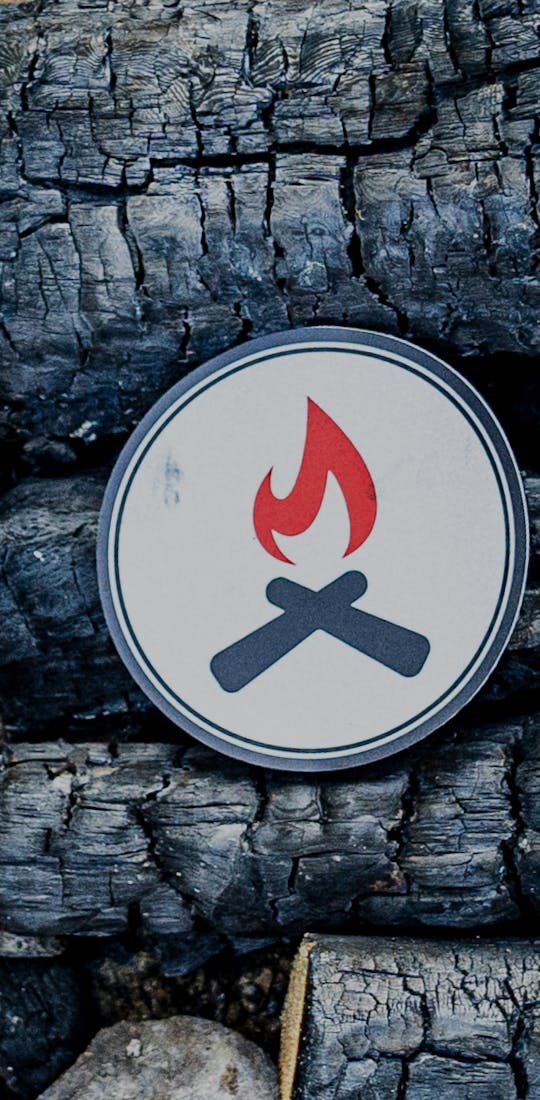 Oboz Black Folks Camp Too logo representing Unity Blaze.