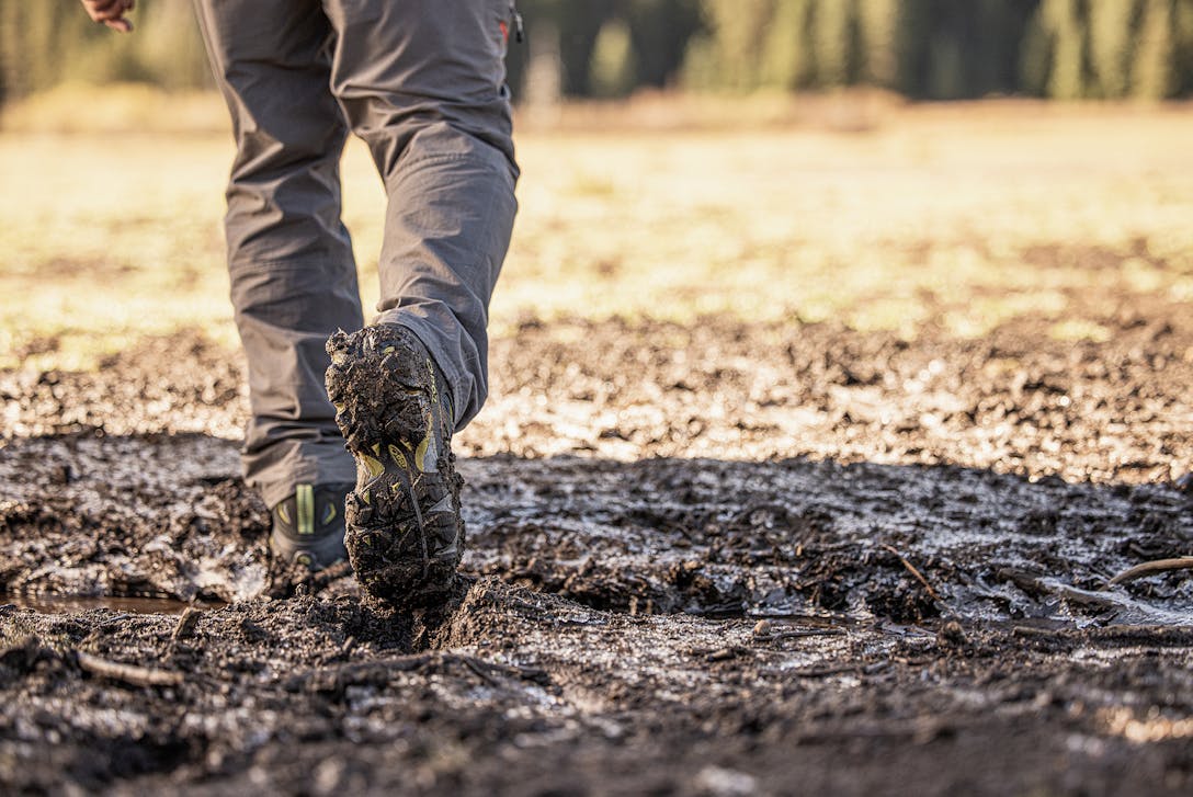 Hiking in the mud in the men's Oboz Sawtooth II.