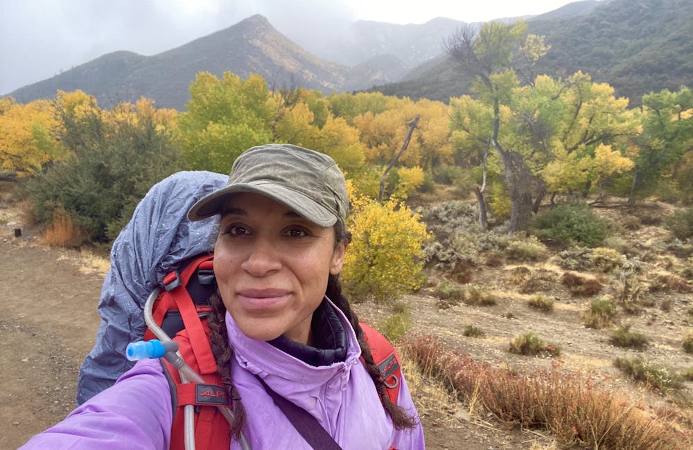 Brandy Brooks hiking in the rain on the Sespe River Trail.