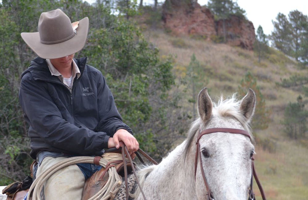 Trailblazer David Gabrielli rides a horse at work on a ranch in Kirby, Montana