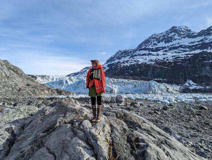 Oboz Trailblazer Ayla Mae Wild hiking in front of a glacier
