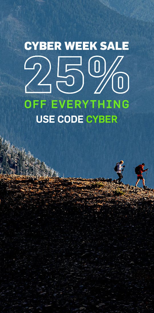 Cyber week sale, 25% off everything, use code CYBER. Two hikers on an alpine ridge