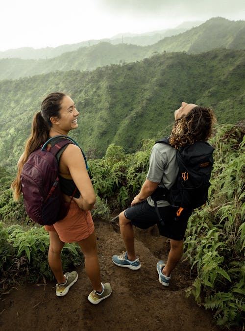 Couple taking in the views while hiking in Hawaii with Oboz Cottonwood Low hiking shoes.