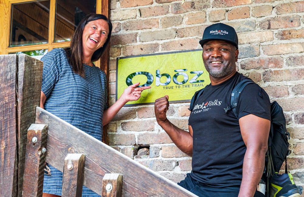 President of Oboz Footwear, Amy Beck with Earl Hunter of Black Folks Camp Too at the Oboz headquarters.