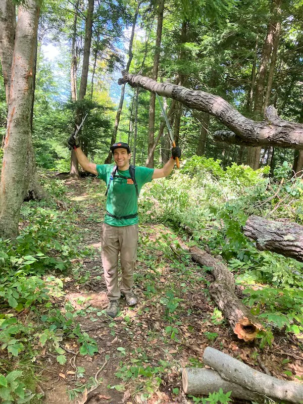 A trail worker helps to build trail systems in Vermont.