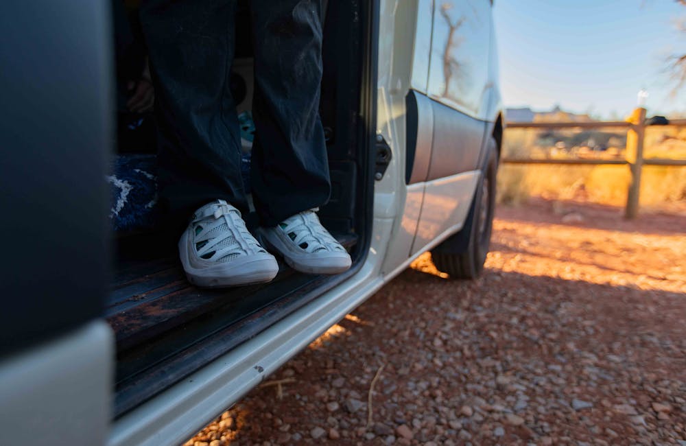 Woman wearing Oboz Whakata Ease while in a Van in Moab, Utah.